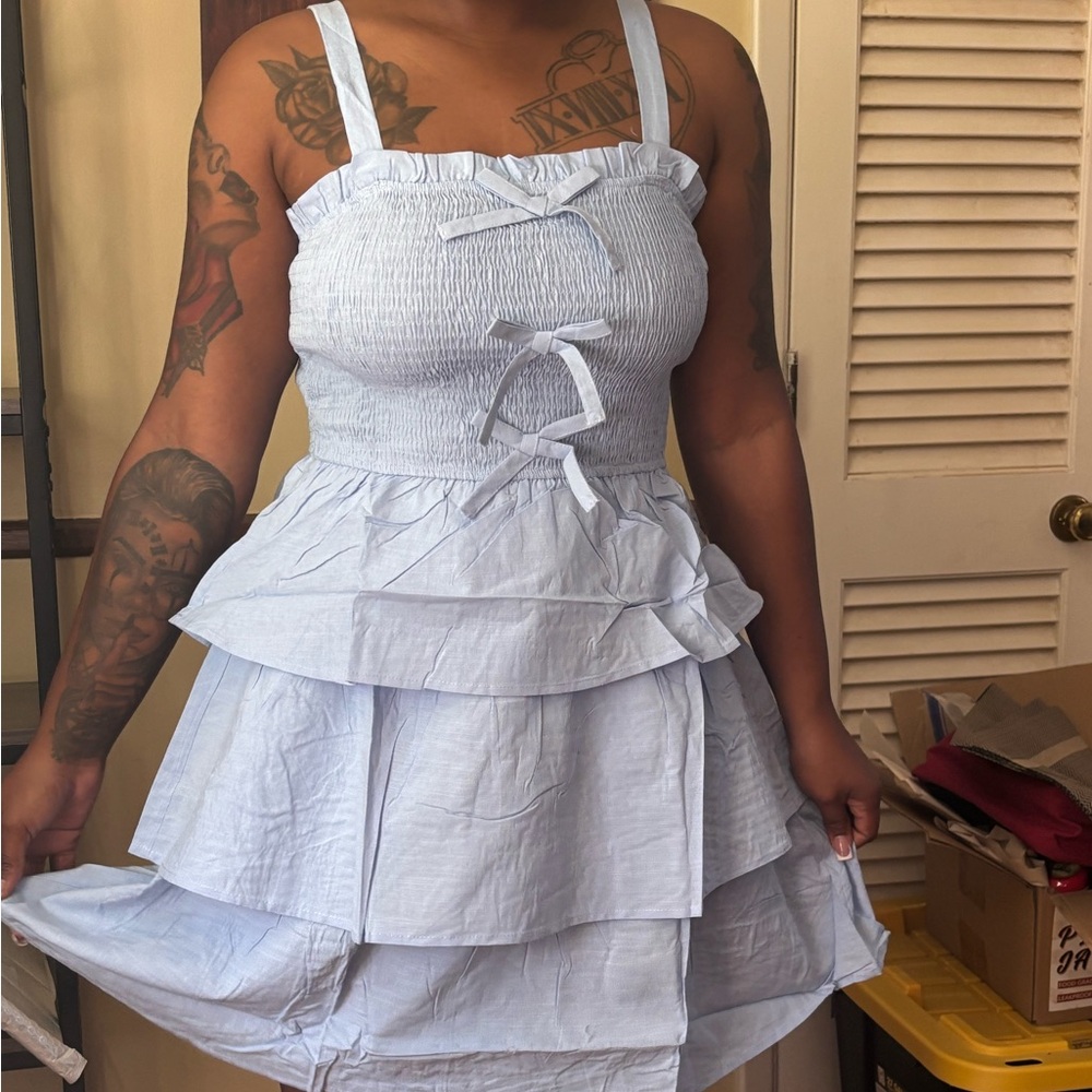 Light Blue Tiered Dress with Bow Accents